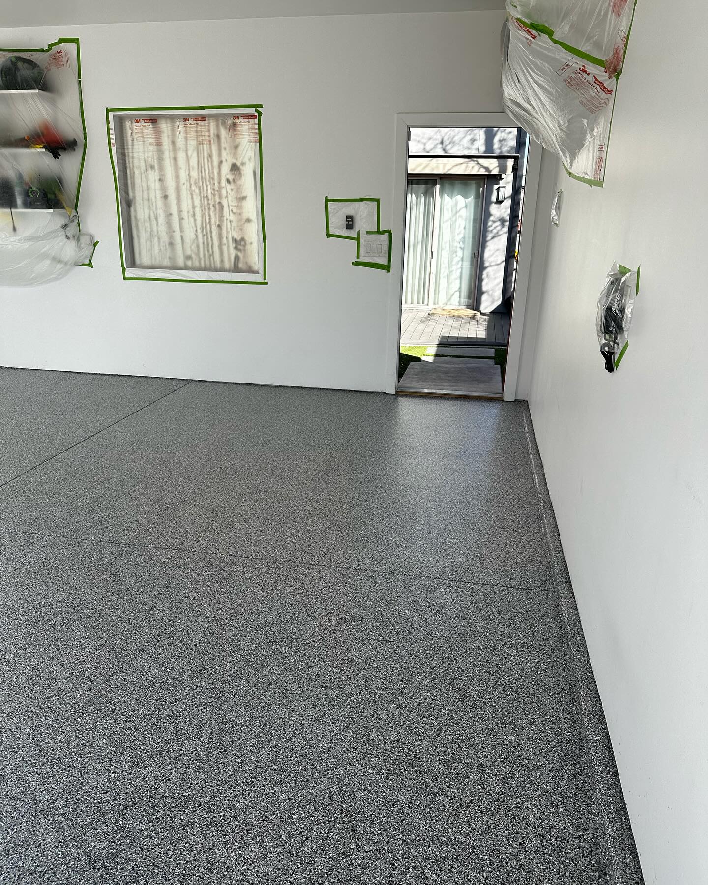 Flake epoxy garage floor in Denver, CO by SBV Concrete Coatings