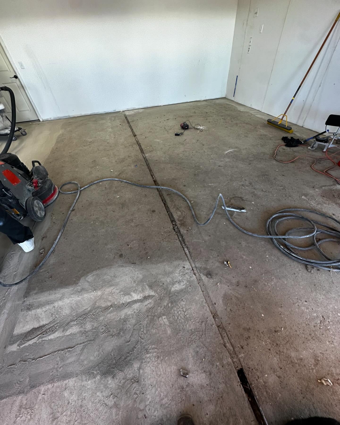 Before: Flake garage floor over a moisture barrier