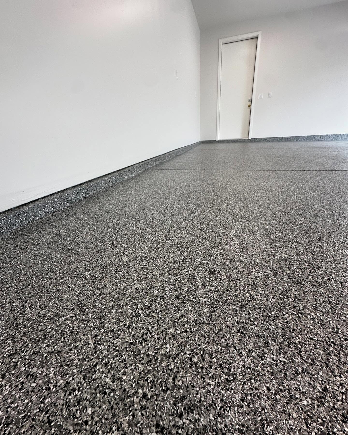 Flake epoxy garage floor in Boulder, CO by SBV Concrete Coatings