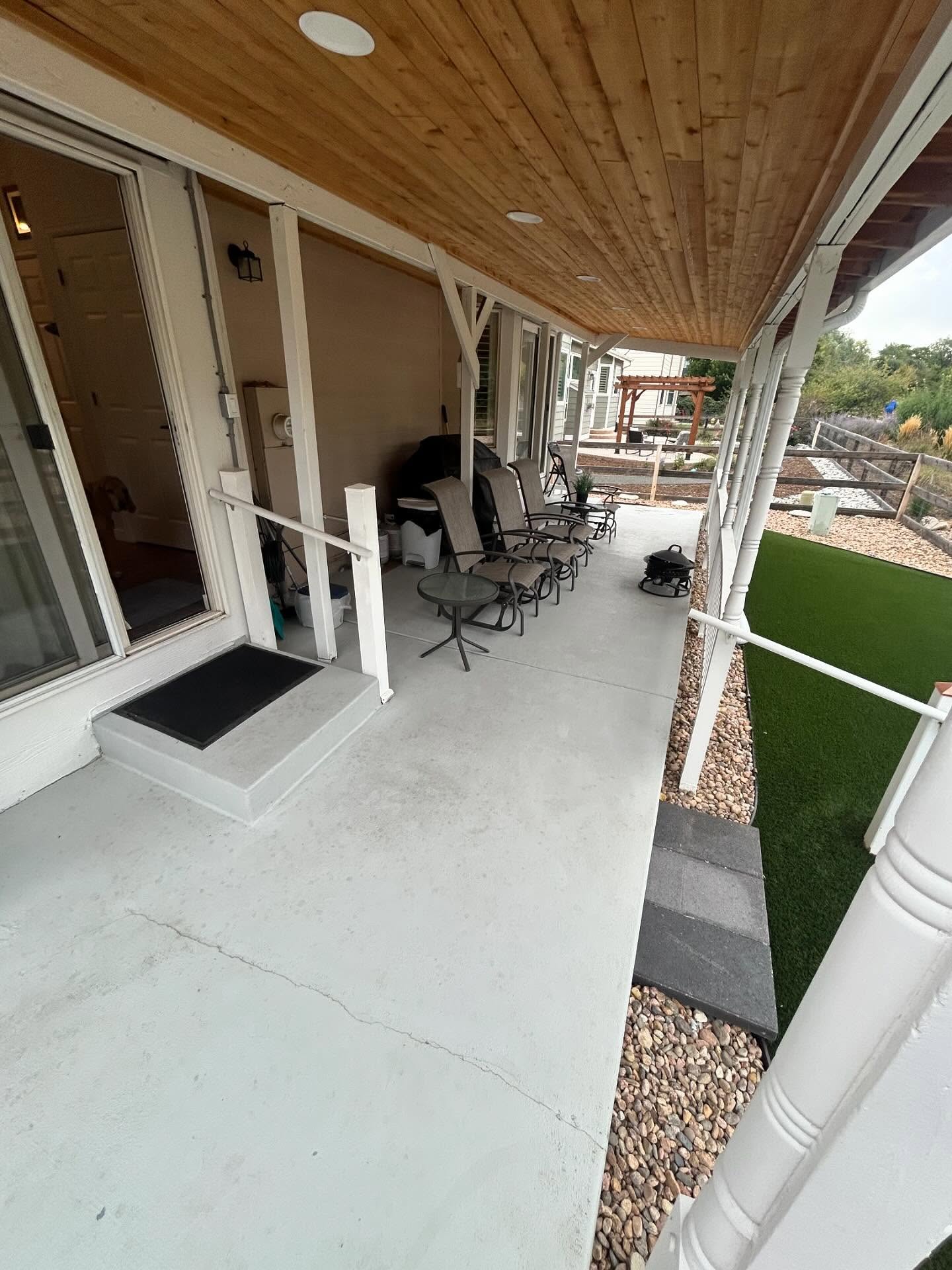 Before: Flake coating on a covered front porch